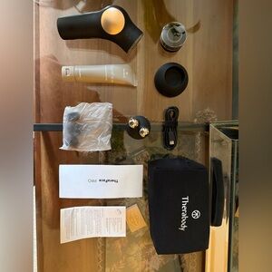 Therabody Theraface Pro Black and Silver Facial Toning Kit